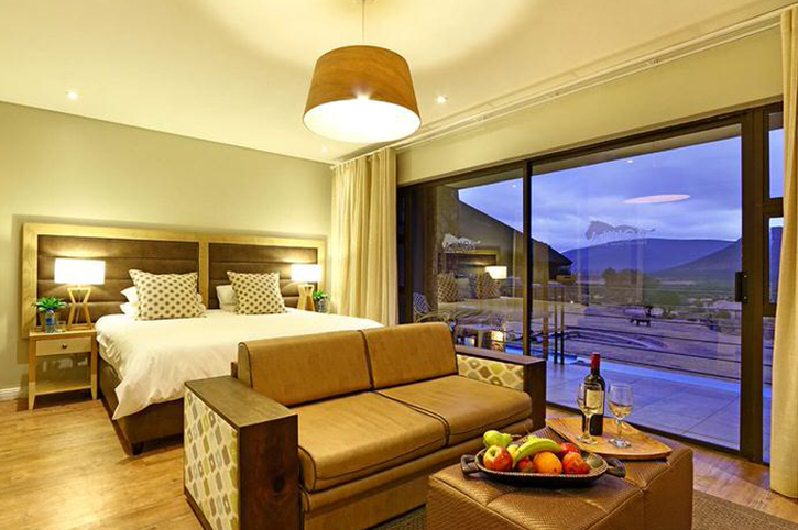 Evening view, Interior of a Premier Lodge Room, Aquila Game Reserve, Western Cape, South Africa