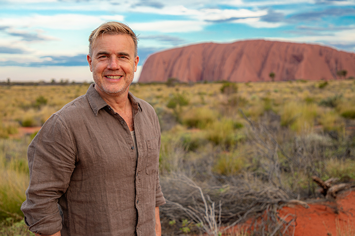 Gary Barlow in front of Uluru, Northern Territory, Australia