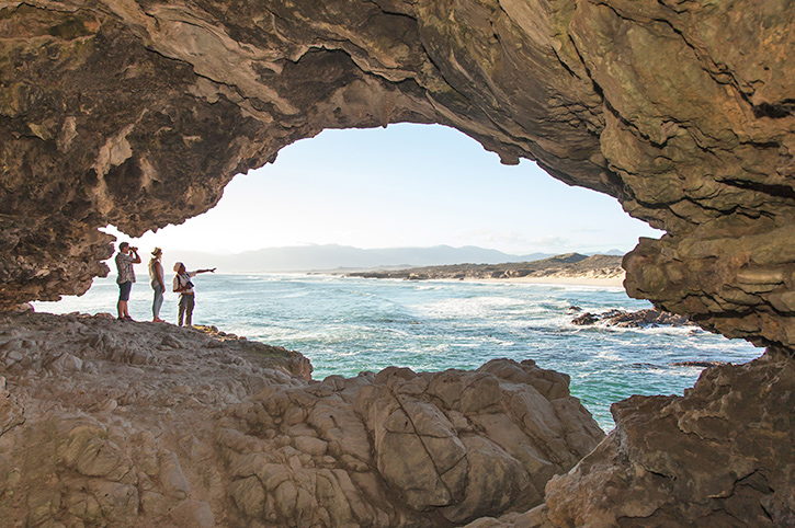 People in Klipgat Caves, Beach & Coastal Safari, Grootbos Nature Reserve, Western Cape, South Africa