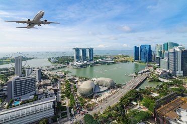 Plane Flying Over Singapore