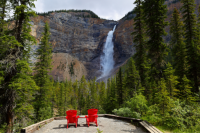 Red chairs in front of Takakkaw Falls, Yoho National Park, Briitsh Columbia, Canada