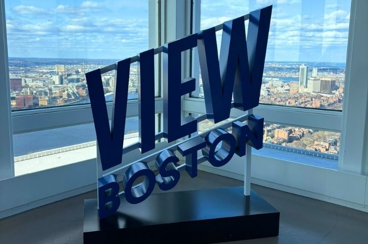 View Boston Sign next to window