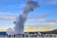 People viewing Old Faithful, Yellowstone National Park